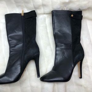 Black leather and suede heeled boots